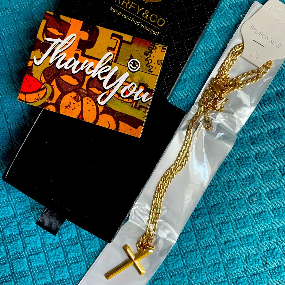 Gold 24 in gold cross necklace, stainless steel.  Very nice gift! Men/Woman’s